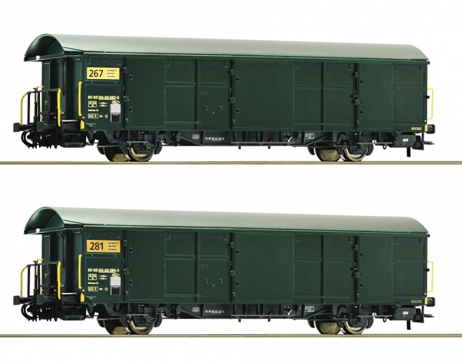Set of 2 postal freight cars of Swisspost with tail light<br /><a href='images/pictures/Roco/Roco-67185.jpg' target='_blank'>Full size image</a>